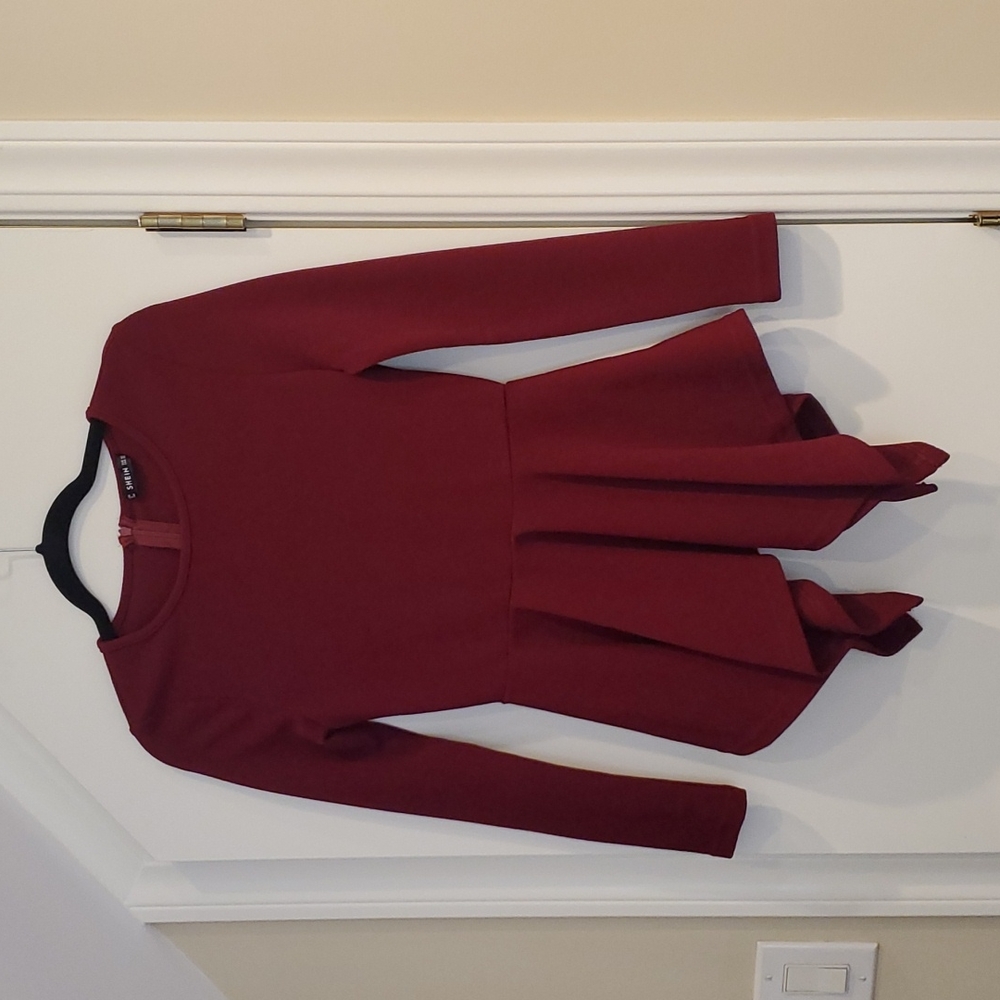 Asymmetrical peplum top